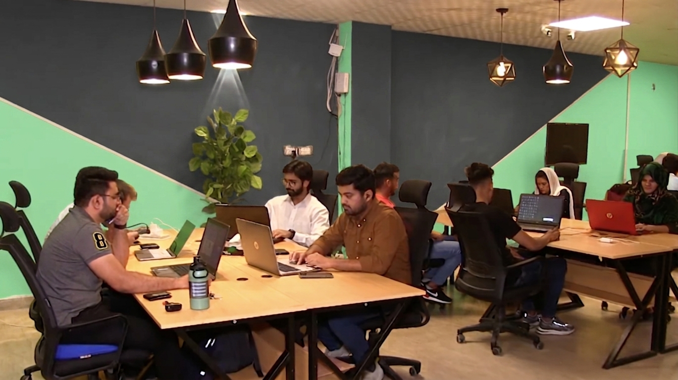 Upverse team collaborating in the office